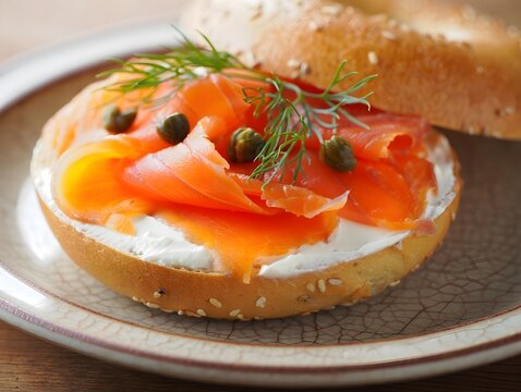 Smoked Salmon and Cream Cheese Bagel with Fresh Herbs on Rustic Plate