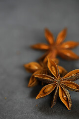 Star Anise on Dark Gray Surface: Aromatic Spice for Cooking, Baking, and Herbal Remedies