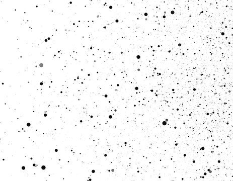 Abstract, scattered, black and gray dots on white background