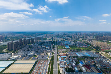 Fototapeta premium Suizhou City presents buildings and industry stretching across Hubei Province in China.