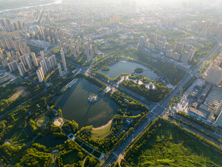 Suizhou City Hubei Province China shows large lake with surrounding parkland and city buildings.