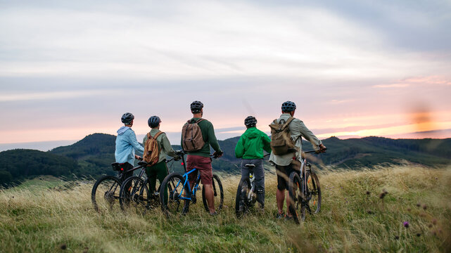 Multigenerational family on cycling trip in nature.