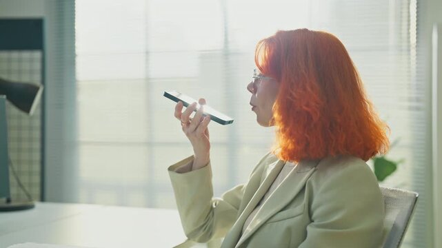 Business professional leverages AI powered assistant and big data analytics on smartphone to discuss strategic fintech consulting, financial planning and data-driven investment insights modern office