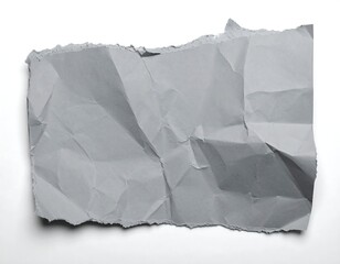 Crumpled, torn piece of gray paper