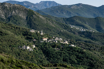 Village beach view Roadtrip Winding road along rocky coast of Cap Corse peninsula on Corsica island France