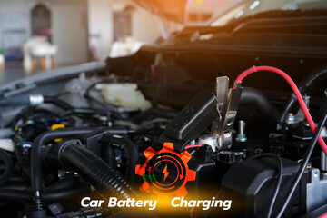 car battery charging process with cables connected to the terminals, showing power flow and maintenance concept for energy, safety, and automotive care.
