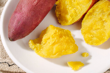Fresh Cooked Sweet Potato Slices on White Plate - Healthy Natural Food Ingredient