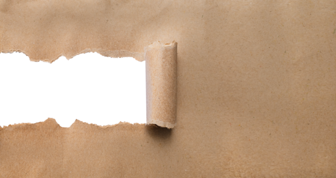The torn kraft brown paper was and has a hole in the middle. Perfect for use in graphic design and advertising or marketing materials..