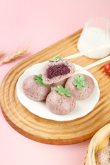Purple Sweet Potato Steamed Buns with Filling on Bamboo Steamer - Asian Dim Sum Dessert