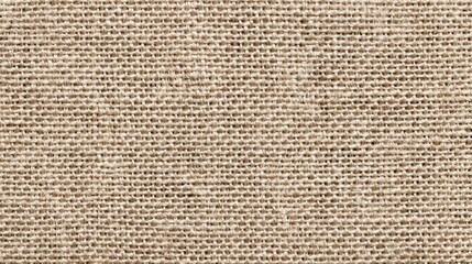 Seamless beige linen fabric surface with woven texture background close up