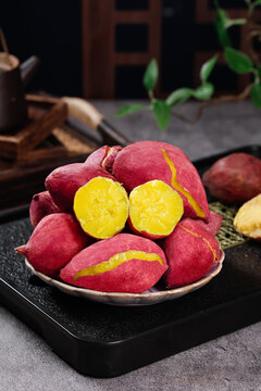 Fresh Roasted Tianmu Mountain Yams with Golden Yellow Flesh on Rustic Plate