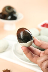 Traditional Gaoyou Salted Duck Egg Chinese Cuisine Delicacy in Hand
