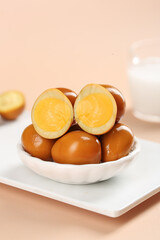 Salt-Baked Marinated Quail Eggs with Golden Yolks in White Bowl Traditional Asian Cuisine Delicacy