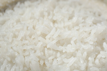 White Long Grain Rice Close-Up Texture Background - Raw Cooking Ingredient Macro Photography