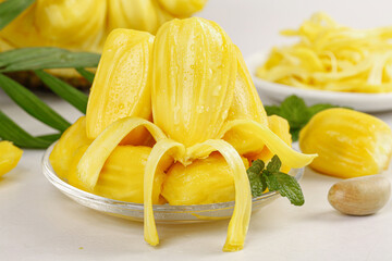 Fresh Vietnamese Honey Pineapple Slices Carved and Arranged with Mint Garnish on White Background