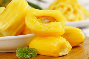 Fresh Golden Polenta Tubes with Mint Garnish on Wooden Board - Traditional Italian Cornmeal Food