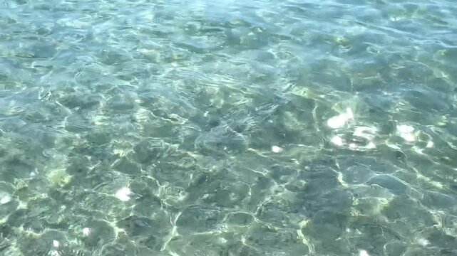 Top view of sea little waves pattern and crystal clear water. Armenia, Sevan. High quality