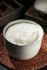 Cooked White Rice in Traditional Ceramic Bowl on Bamboo Placemat - Asian Food Photography