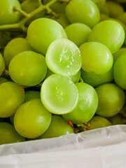 Fresh Green Seedless Grapes Cut in Half Showing Sweet Juicy Interior