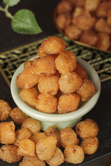 Dried Longan Fruit in Bowl - Traditional Asian Snack and Herbal Tea Ingredient