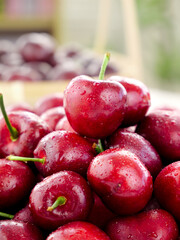 Fresh Red Cherries with Water Drops in Natural Light - Organic Fruit Background