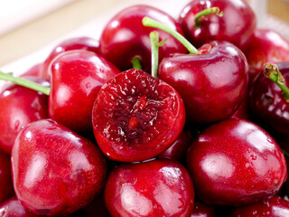 Fresh Red Shandong Cherries with Cut Half Showing Interior - Domestic Fruit