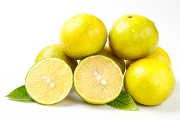 Fresh Wuming Citrus Fruits from Guangxi China with Leaves on White Background