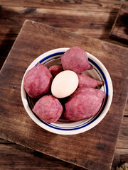 Fresh Purple and White Yams in Bowl on Wooden Board - Healthy Root Vegetables