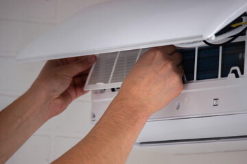 Air Conditioner Maintenance: Removing a Dirty Air Filter