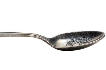 Vintage Silver Spoon Against Black Background