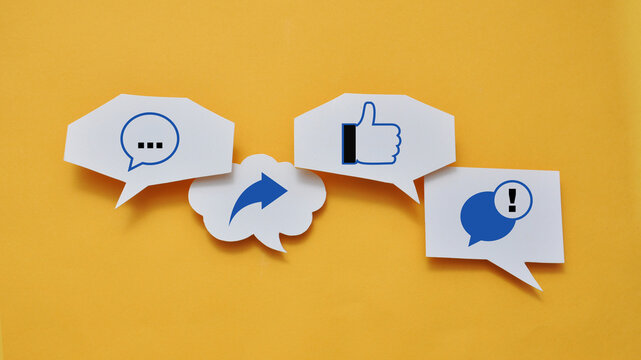 Online Communication and Social Media Concept with Icons in Speech Clouds - Powered by Adobe