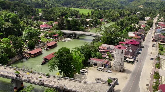 Aerial 4k 60fps Drone footage from Famous Loboc River and old town. Cinematic footage of the famous river and one of the main attractions on Bohol. Pan on old chuch