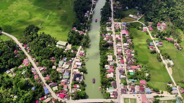 Aerial 4k 60fps Drone footage from Famous Loboc River and old town. Cinematic footage of the famous river and one of the main attractions on Bohol