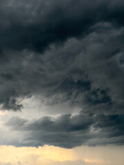 Beautiful nature view with cloudy sky before rain dark clouds on a summer evening.