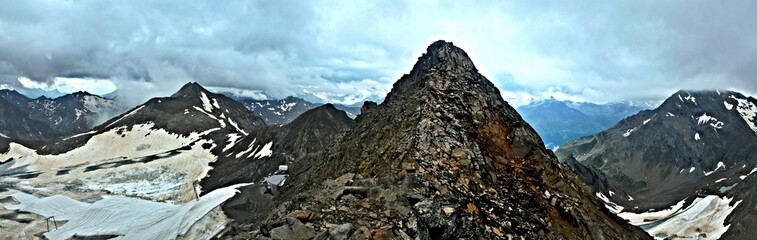 Austrian Alps - panoramic view of the peaks in Stubai Alps from the observation deck Top of Tirol