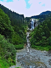 Austrian Alps - view of the Mischbach-waterfall near village Gasteig in Stubai Alps