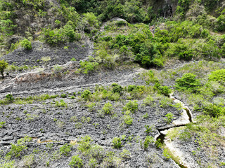 Obraz premium Aerial view of the expanse of karst rocks in a village
