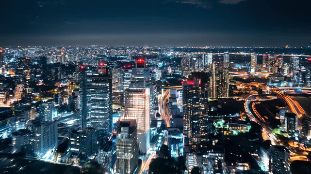 Glittering city skyline at blue hour reveals dense high‑rises and traffic rivers, a cinematic establishing shot for finance, tech, and travel stories set in a modern global metropolis.