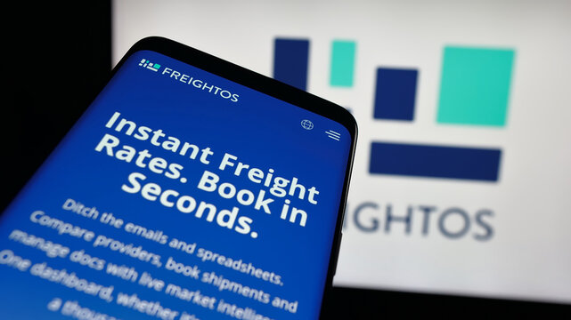 Stuttgart, Germany - 09-25-2025: Mobile phone with website of freight booking company Freightos Ltd. on screen in front of logo. Focus on top-left of phone display.