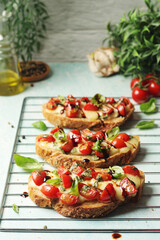 Freshly made bruschetta sandwiches - traditional dish of Italian cuisine	