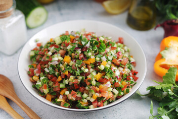 A bowl with traditional Israeli Salad