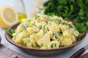 A bowl with Greek potato salads