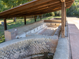 Roman shared bathroom at Villa di Domiziano, Roman imperial villa of the late Republican era at Circeo National Park, Italy
