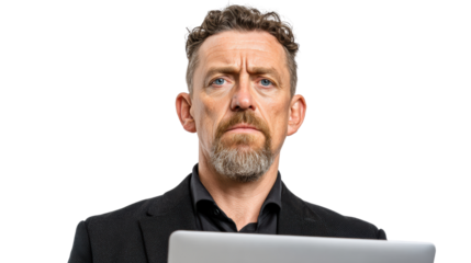 Serious business professional focused on work with laptop in hand, isolated on white background.