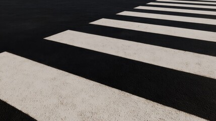 Striking contrast between white stripes and dark asphalt creates