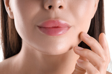 Fototapeta premium Woman with beautiful lips on white background, closeup