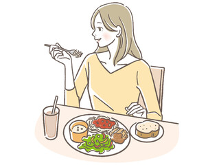 洋食を食べる女性
