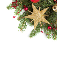 Fir branch with red and gold Christmas ornaments isolated on white background. Flat lay.  Christmas and New Year holidays background.
