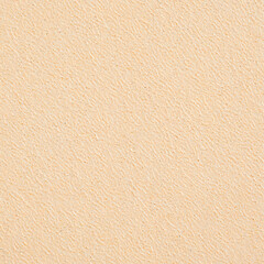 Subtle speckled texture background in light tan and beige tones