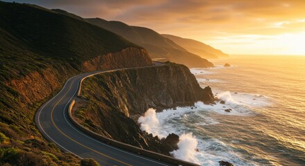 Winding coastal road along cliffs at sunset with ocean waves and mountain range landscape